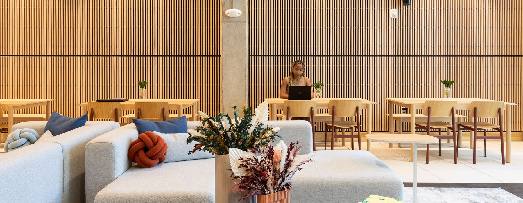 The essence of exceptional living woman sitting at a table with chairs